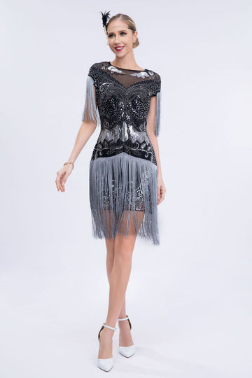 Vestido corto flapper de lentejuelas grises de la década de 1920 con flecos